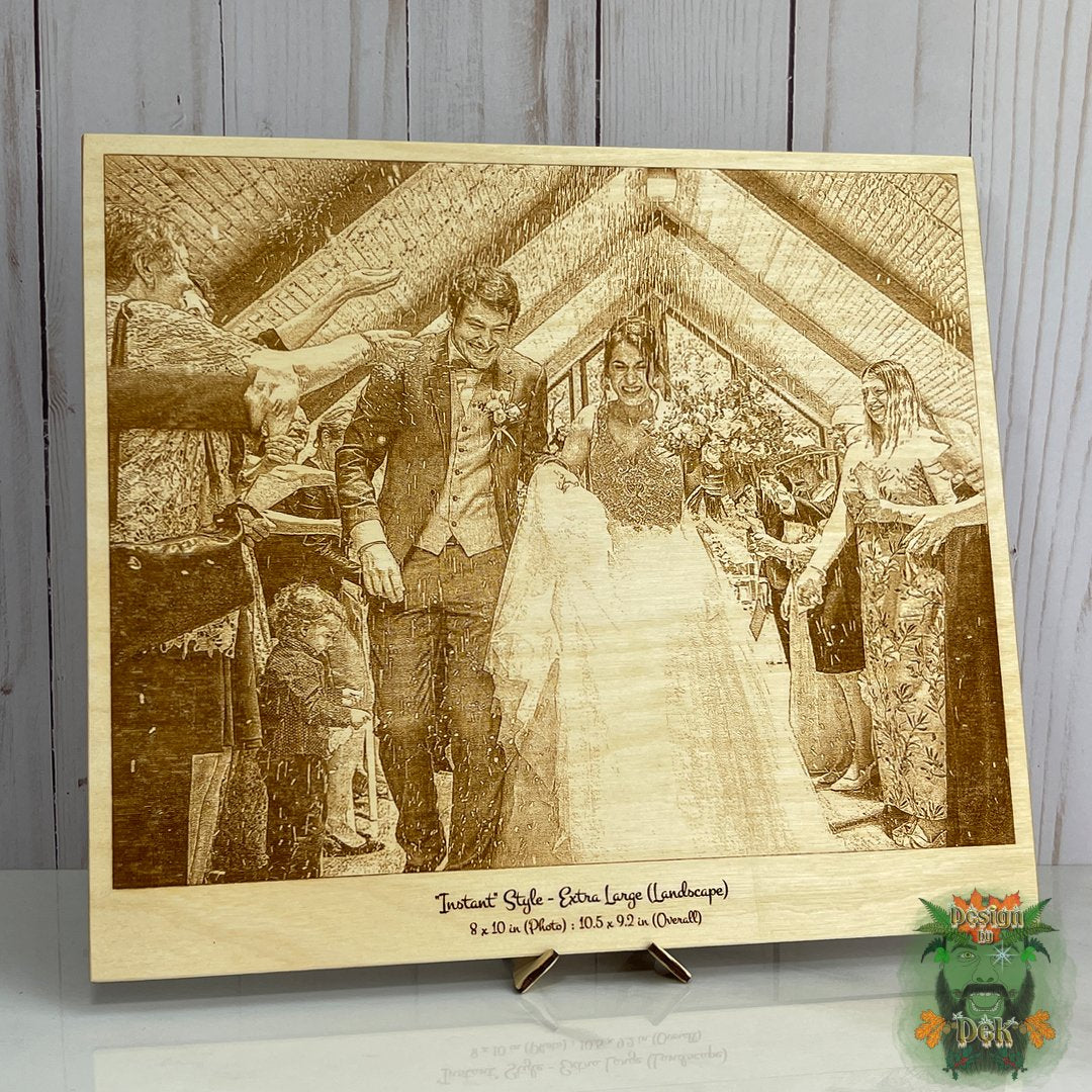 Wooden engraved plaque with a wedding scene on a wooden stand.